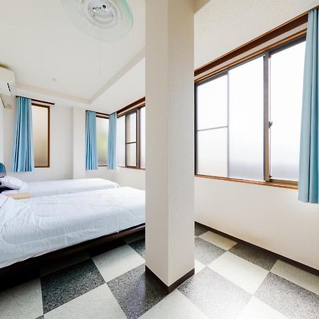 Yolee Guest House Izumisano Esterno foto